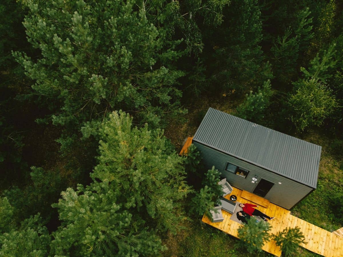Aerial view of a cabin in a forest